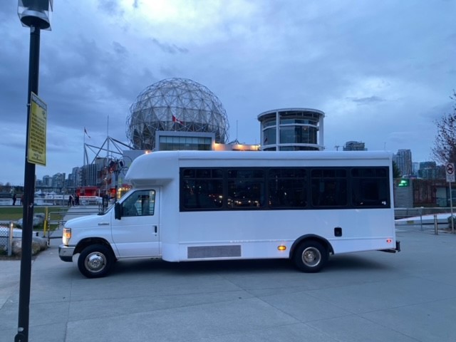 ITTG's party bus in front of Science World in Vancouver