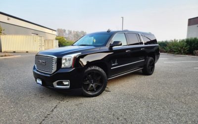 A black SUV after professional vehicle detailing.